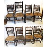 A harlequin set of eight 19th century North Country spindle back rush seated chairs on turned legs