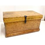 A vintage pine apprentice made tool chest of small size with twin carrying handles, the hinged lid