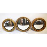 Three Regency style gilt framed sphere decorated convex wall mirrors, each approx 46 to 50cm