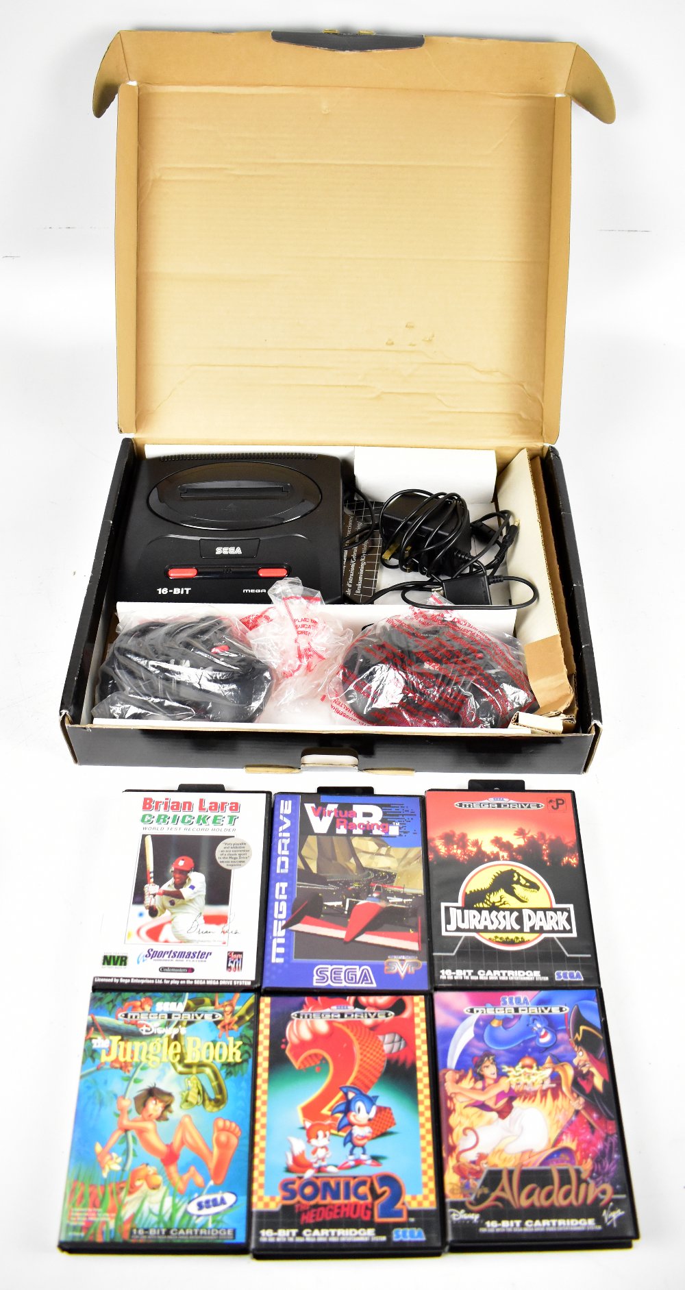 SEGA; a boxed Megadrive II with two controllers, RF and power units, also six games comprising '