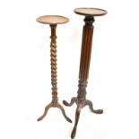 A 19th century mahogany torchere stand raised on tripod supports, height 128cm, and a similar oak