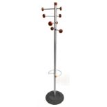 A retro coat and stick stand with adjustable pegs to upper section, on circular base, height 174cm.