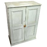 A painted old pine two door cupboard, the pair of doors enclosing three fixed shelves, height 106cm,