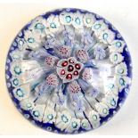 OLD ENGLISH; a millefiori canework paperweight, diameter 10.8cm.Additional InformationSmall chips,