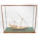 A scratch built wooden model ship, ‘Al Bahran’, in glazed display case, the case 59.5 x 70cm.