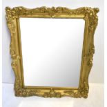 A moulded gilt framed wall mirror with bevelled glass, 63 x 53cm.Additional InformationScuffs and