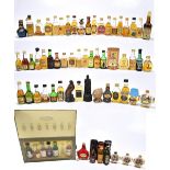 MIXED SPIRITS; a collection of miniatures comprising predominantly Whisky and Cognac/Brandy