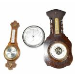 An early 20th century oak cased barometer, length 55cm, and two further barometers with silvered