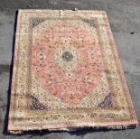 CHAKHARI; a large Indian hand knotted wool pile carpet with stylised foliate motifs on cream