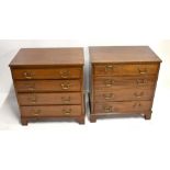 A small pair of mahogany narrow four door chests on bracket feet, height 61cm, length 57.5cm,