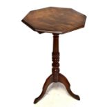 A 19th century tilt-top tripod table with octagonal top, height 72cm, diameter 42cm.Additional