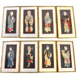 A set of eight Chinese embroidered silk figures depicting the eight immortals, four featuring