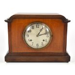 NEWHAVEN USA; an Edwardian mahogany and inlaid eight day mantel clock, the circular silvered dial