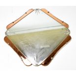 An Art Deco peach glass shaped wall mirror, 60 x 60cm.Additional InformationSome scratches,