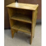 A Victorian waxed pine side table with attached towel rail and two fixed shelves, height 709cm,