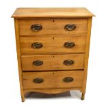 An Edwardian pine chest of four drawers on turned supports, height 107cm, width 84cm, depth 43cm.