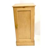 An old pine panel door bedside cupboard and a stool (2).