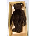 STEIFF; a limited edition replica dark brown teddy bear, fitted in original box and complete with