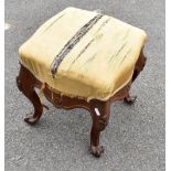 A Victorian carved walnut footstool on cabriole supports, height 69cm.Additional InformationThe