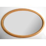 A pine framed oval mirror, 60 x 89cm.Additional InformationGeneral wear throughout.