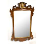 A 19th century mahogany Chippendale-style fret carved wall mirror with gilt bird detail, 104.5 x