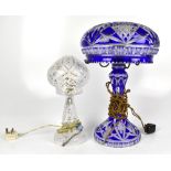 A 20th century Bohemian blue flashed glass mushroom lamp, with cut decoration, height 46cm, together