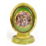 An unusual Art Deco onyx, green enamel and painted enamel eight day timepiece, the circular dial
