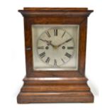 WINTERHALDER & HOFFMEIER; a 19th century oak cased four glass quarter chiming mantel clock, the