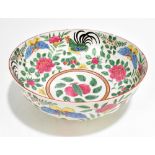 A late 19th/early 20th century Chinese Famille Rose porcelain footed bowl, painted with cockerels,