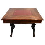 A Regency rosewood library table, with leather inset on carved baluster supports with central