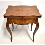 A mid/late Victorian figured walnut and amboyna inlaid work table, the serpentine shaped hinged