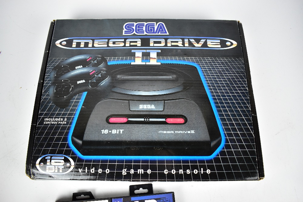 SEGA; a boxed Megadrive II with two controllers, RF and power units, also six games comprising ' - Image 3 of 4