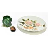 DOULTON; a 19th century hand painted charger decorated with floral sprays, diameter 34cm, together