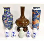 A 20th century Japanese porcelain sleeve vase, with blue floral decoration with gilt highlights,