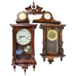 Two wall clocks including a Lincoln thirty one day mahogany cased reproduction example, the