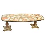 A decorative onyx and hardstone coffee table on twin pedestal supports, 153 x 56cm