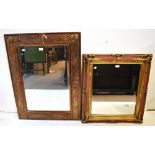 Two modern rectangular decorative bevelled wall mirrors, 100 x 73.5cm and 80 x 70cm.