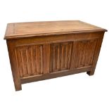 An early 20th century oak blanket box with linenfold carved decoration, width 95cm.Additional