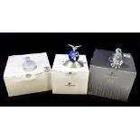 SWAROVSKI; three crystal figures, including eagle, crystal planet vision, circa 2000, etc, each in