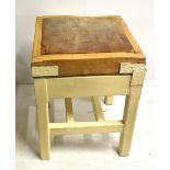 A vintage butchers block, 62 x 62cm on white painted stand.