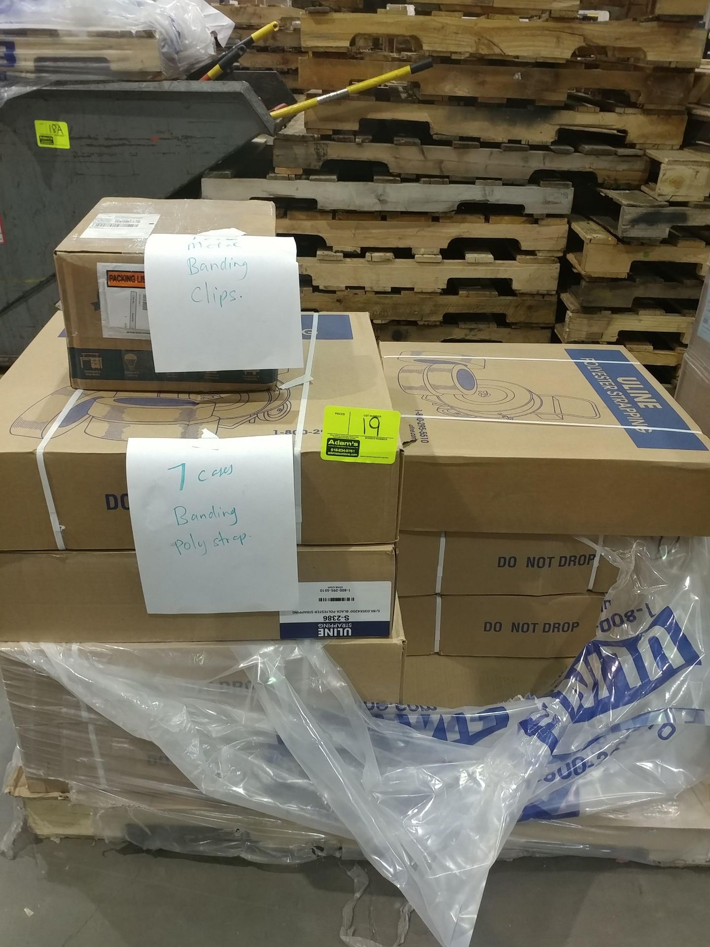 (7) cases of banding poly strap and (1) case of metal clips