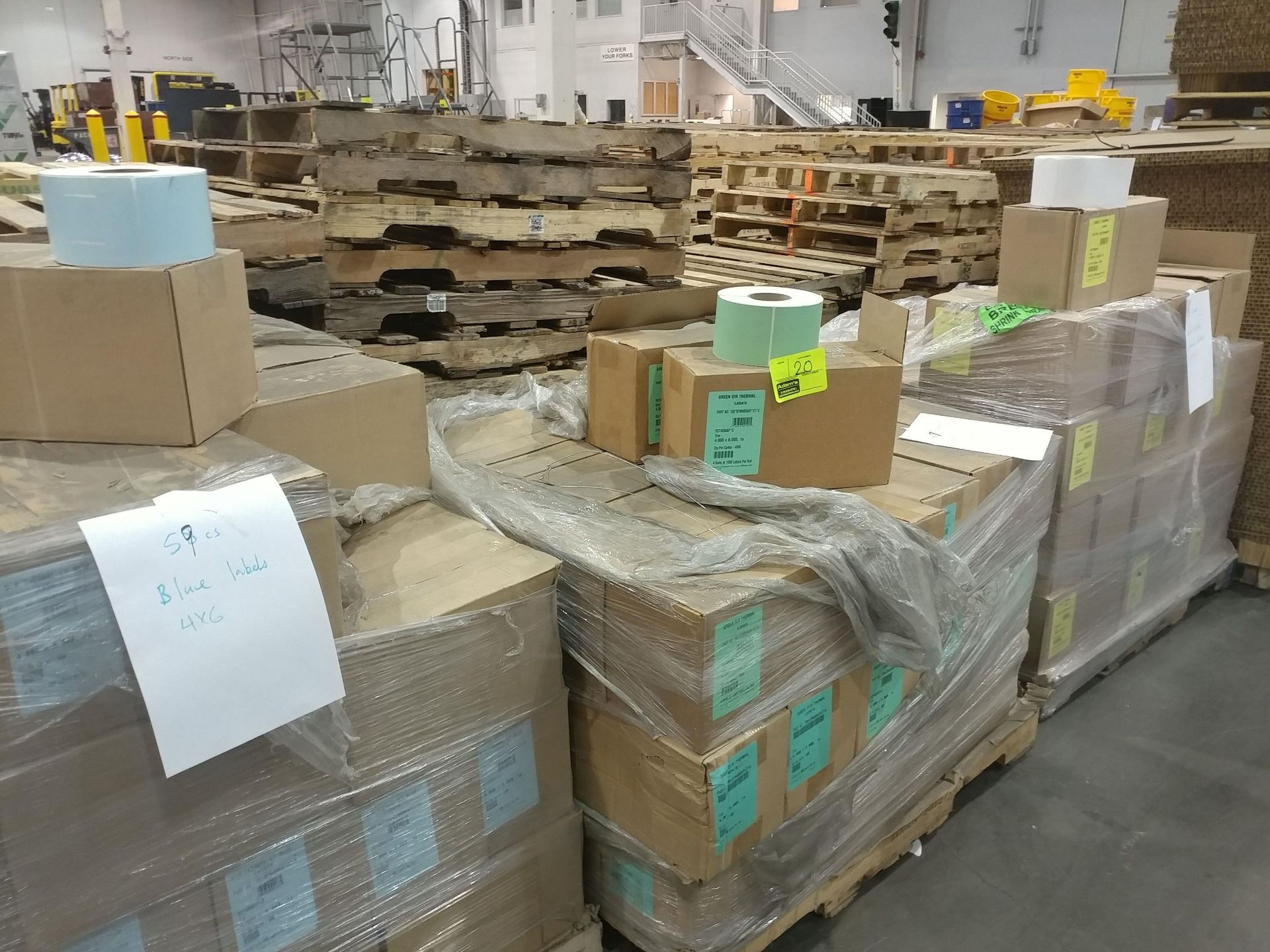 (3) palles of blue, green, and white labels