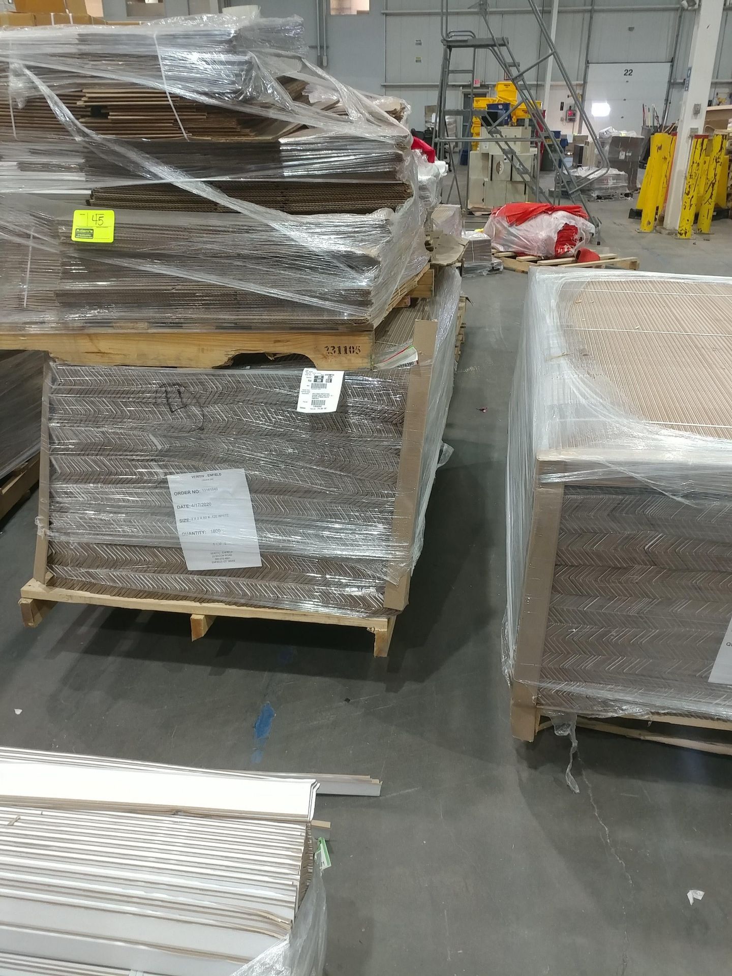 (5) pallets of corner boards, (2) pallets of boxes, onion sacks