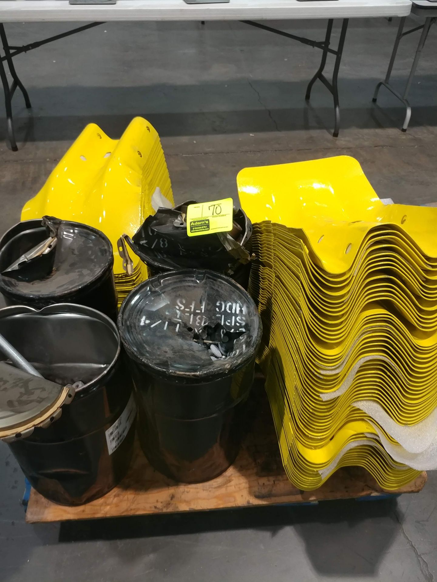 Yellow protective guards, nuts, and bolts