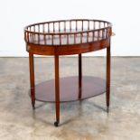 OVAL MAHOGANY ROLLING BAR CART