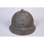 Casque Adrian modèle 26. Attribut de la coloniale modèle 15. Fabricant MA.M.OU Marseille 1938. Coque