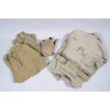 US- Lot comprenant une veste en toile HBT portant dans le dos le marquage de prisonnier de guerre