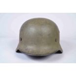 Casque Allemand modèle 1940. Fabricant ET62. N° de série 842. Peinture d'usine bleue recouverte d'