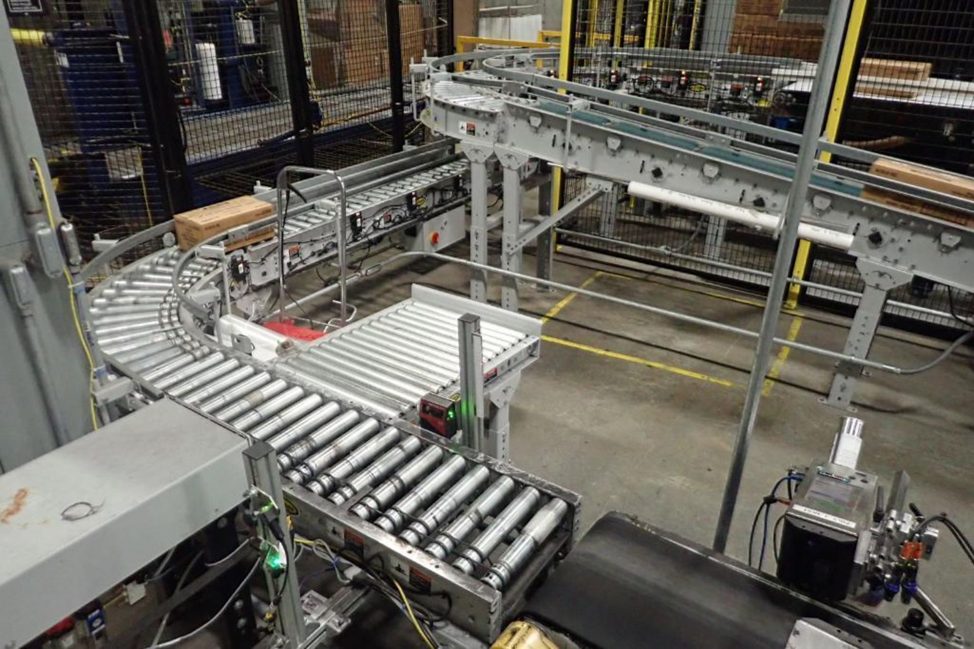 35 ft. long power roller case conveyor