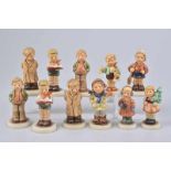 GOEBEL/ HUMMEL 11 Figuren, 1x 'Club Edition', Porzellan, polychrome Bemalung, blaue Manufakturmarke,